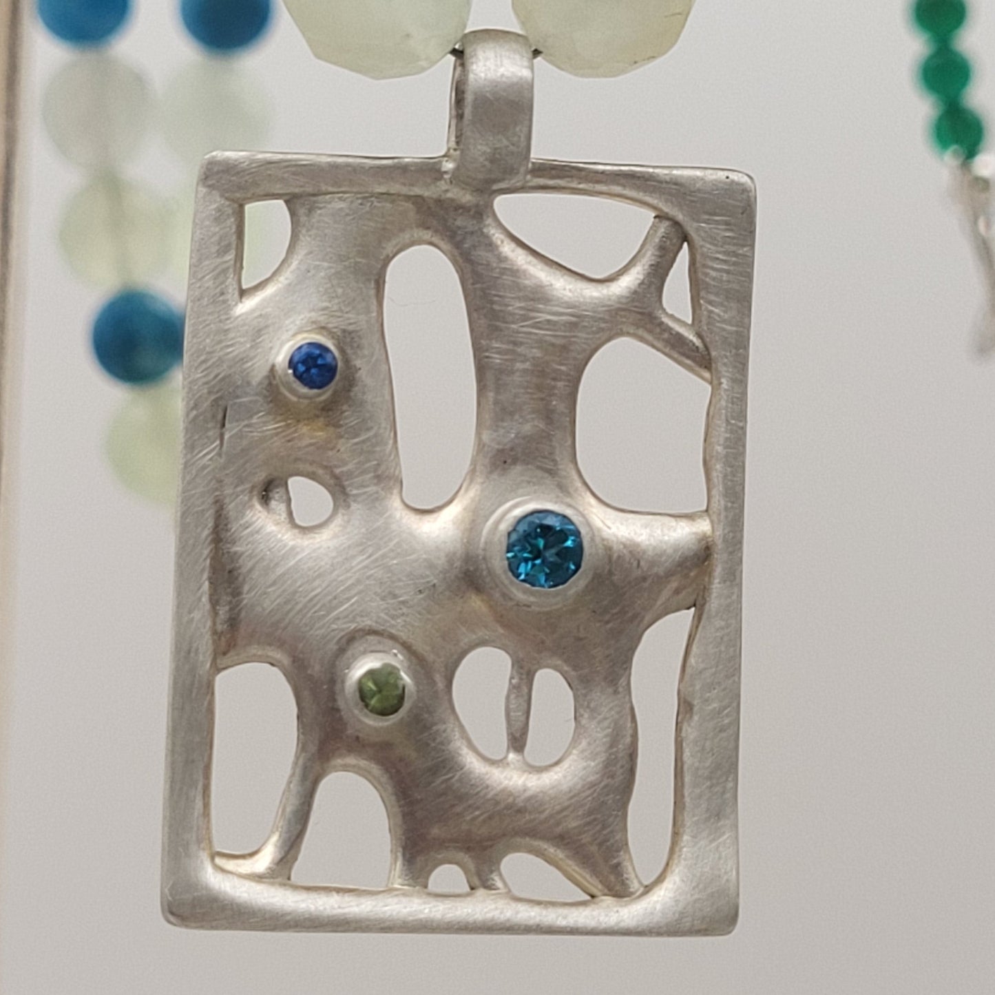 Secret River – Anhänger aus Sterling Silber mit Blauem Topas & Peridot